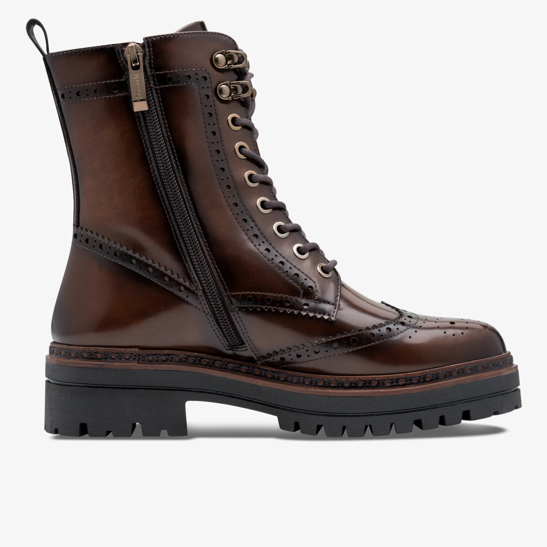 Robust brown brogue boot with chunky sole, side zipper and detailed stitching in clear side view