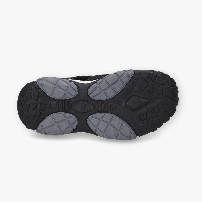 Robuste und griffige Profilsohle eines Sportschuhs für optimalen Halt und flexiblen Laufkomfort