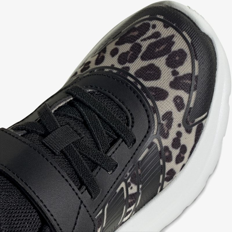 Schuh mit modischem Leopardenmuster und weißer Sohle, bequemer Sneaker für den Alltag
