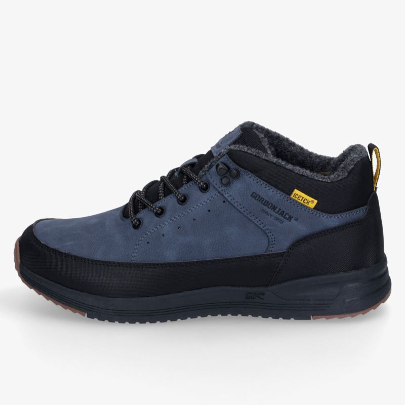 Robuster dunkelblauer Schnürschuh mit gepolsterter Sohle, griffigem Profil und modernem Design in schräger Seitenansicht