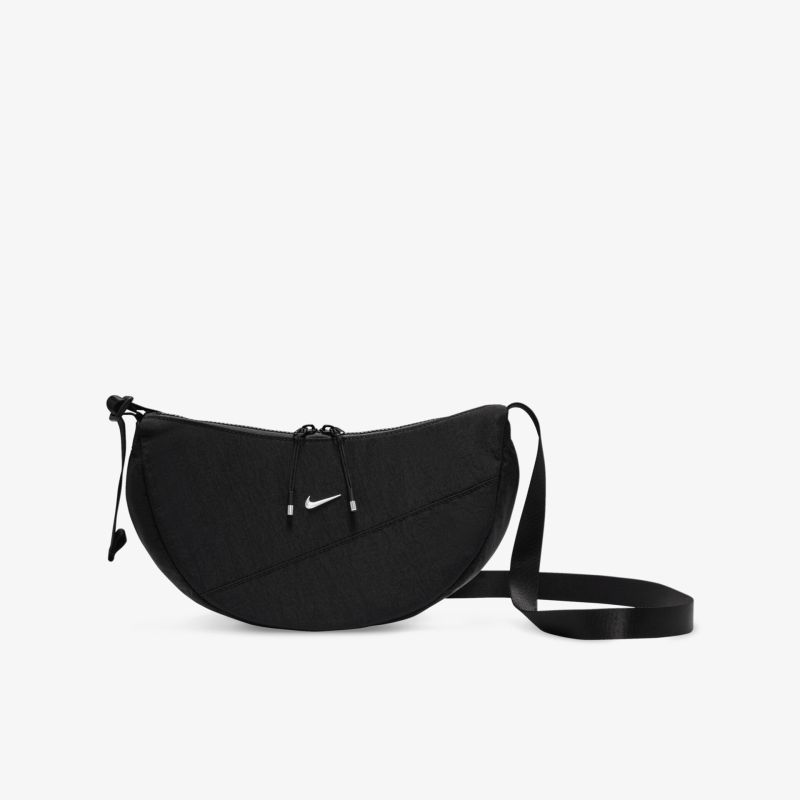 Schwarze kompakte Umhängetasche mit verstellbarem Gurt und Reißverschlussfach, ideal für den Alltag