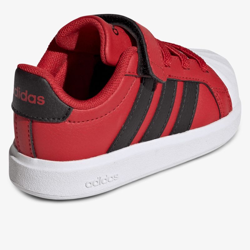Roter Sneaker mit weißen Sohlen und schwarzer Streifendekoration, bequemer und stylischer Sportschuh
