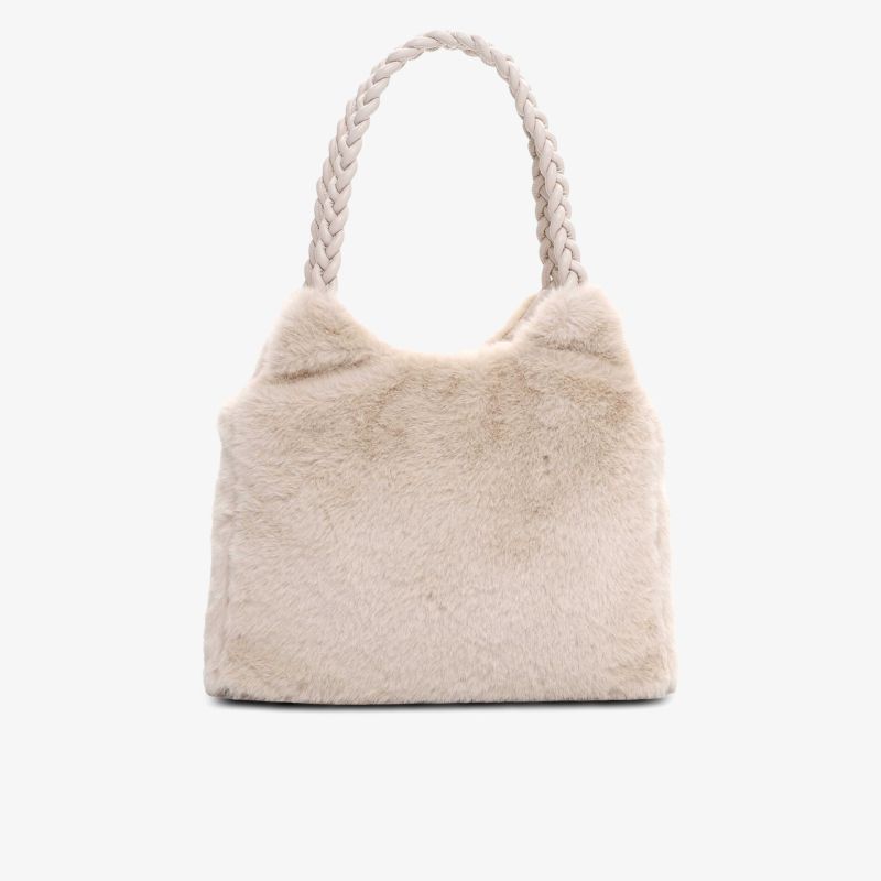 Weiche Tasche in Felloptik mit geflochtenem Griff, ideal für den Alltag und modische Outfits
