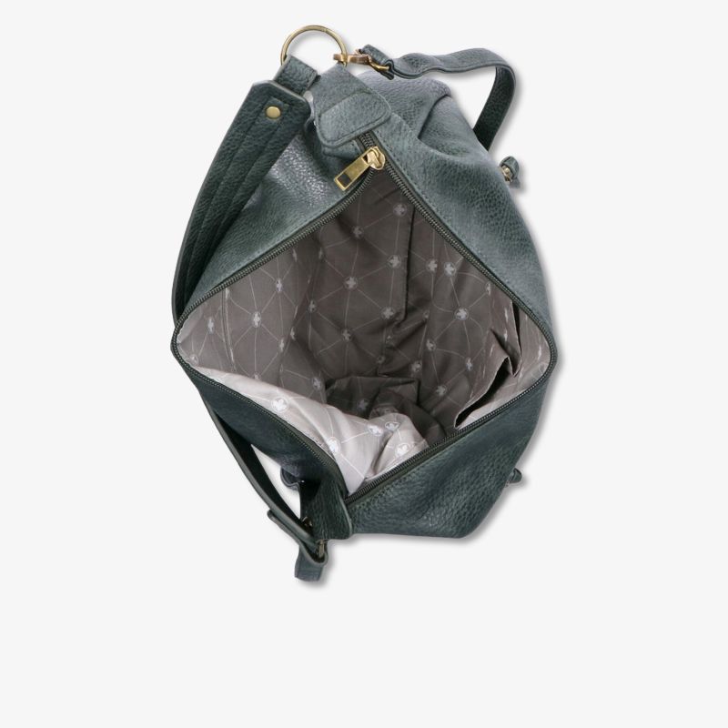 Offenes Innenfach einer Tasche mit gepunktetem Innenfutter und geräumigem Stauraum