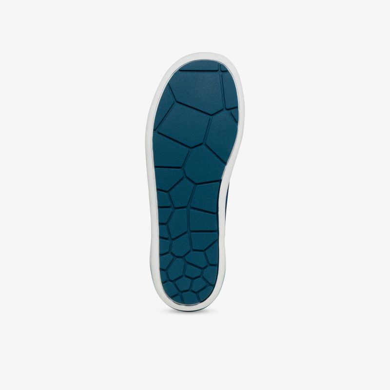 Rutschfeste und langlebige Schuhsohle mit modernem Design für optimalen Komfort und Halt.