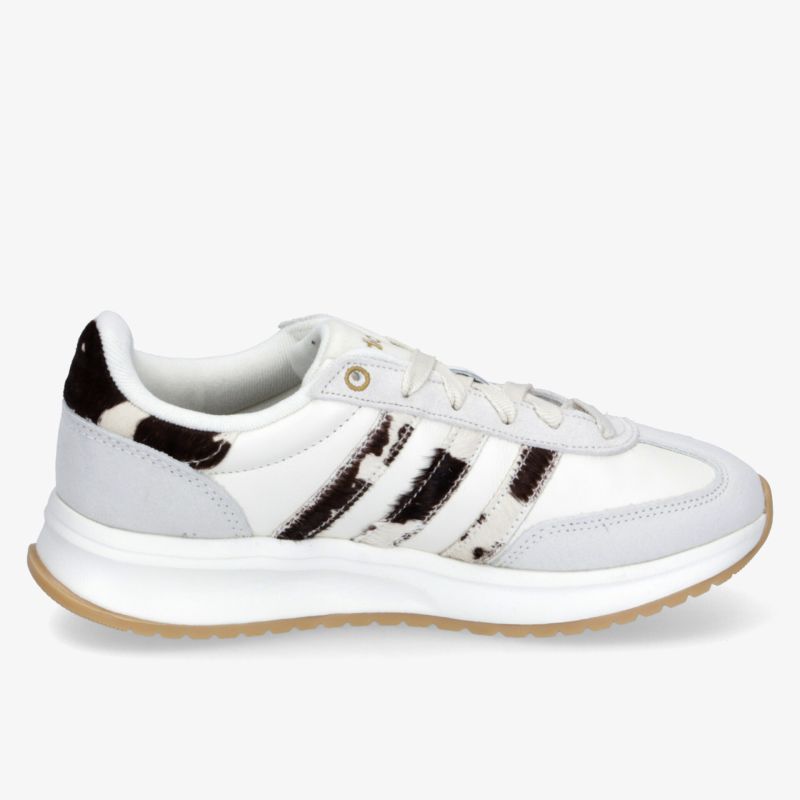 Leichter weißer Sportschuh mit schwarzem Design, rutschfester Sohle und komfortabler Polsterung für beste Stabilität