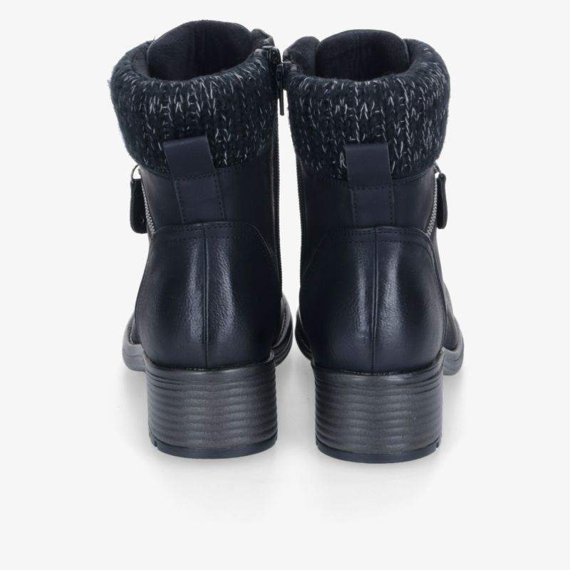 Robuste schwarze Stiefel mit Strickkragen und Blockabsatz, ideal für kalte Tage. Stilvoll und bequem.