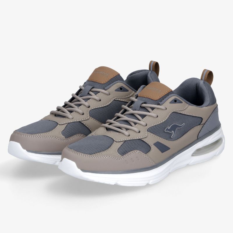 Sportliche Laufschuhe in Beige und Grau, bequem mit gedämpfter Sohle und modernem Design als Paar präsentiert