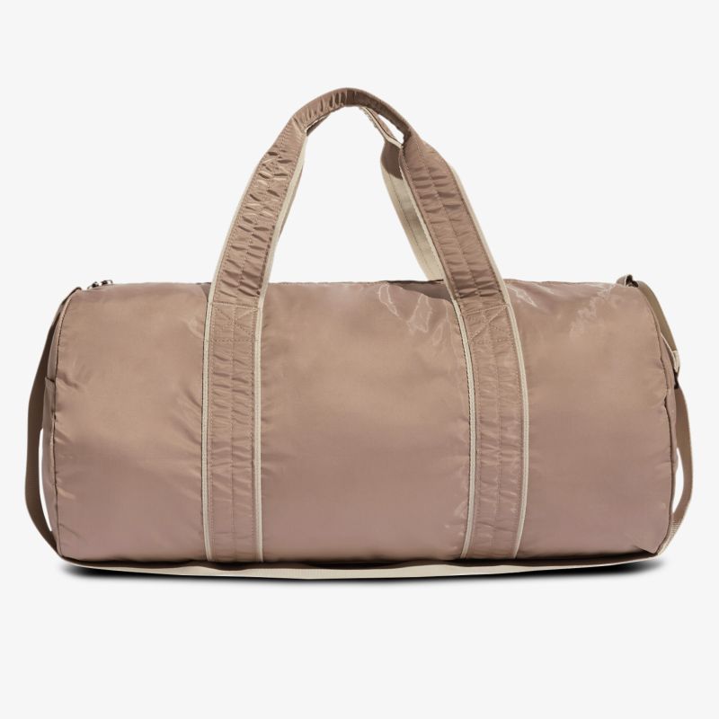 Große, robuste Reisetasche mit doppelt verstärkten Tragegriffen und abgerundeter Form für komfortables Tragen