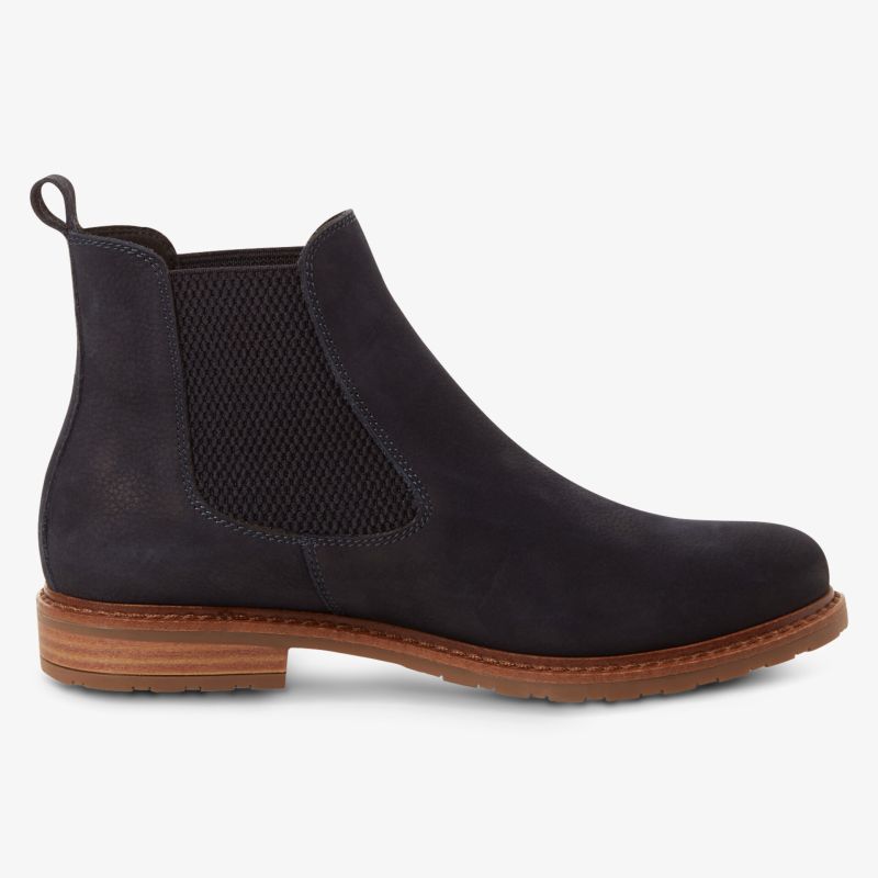 Robuster und bequemer Chelsea-Boot mit flexiblem Material und eleganter Holzsohle, ideal für vielseitigen Einsatz