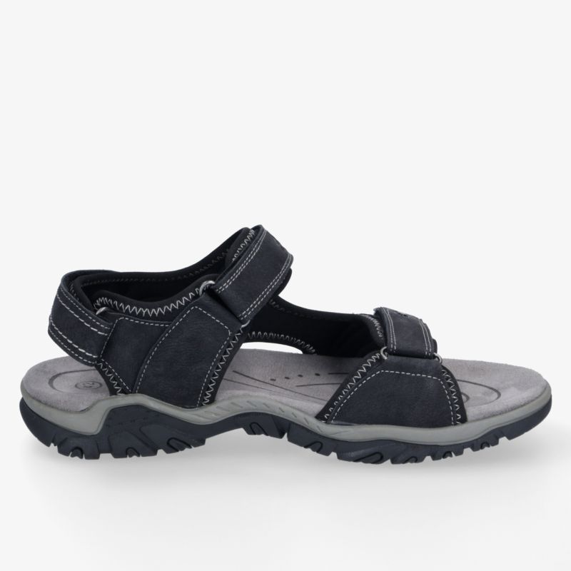 Seitliche Ansicht einer robusten, verstellbaren und rutschfesten Sportsandale mit gepolsterter Sohle