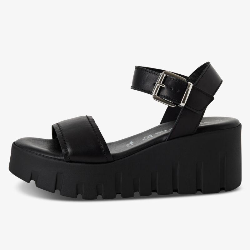 Schwarze Plateau-Sandale mit dicker Profilsohle und verstellbarem Knöchelriemen für hohen Tragekomfort