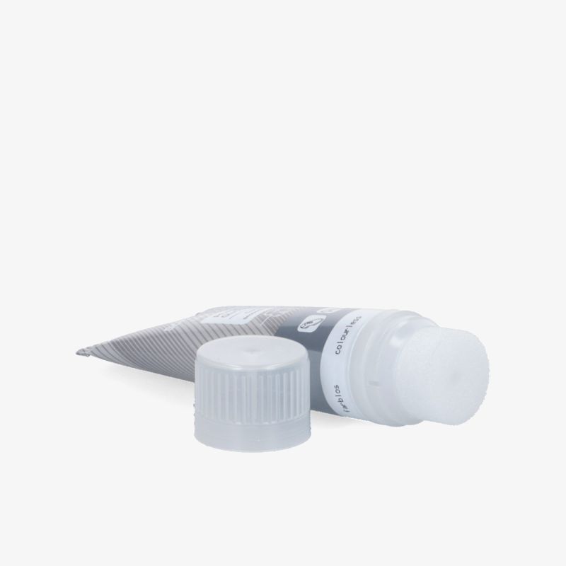 Weiße Kunststofftube mit geöffnetem Schraubverschluss, kompakt und praktisch für einfache Anwendung