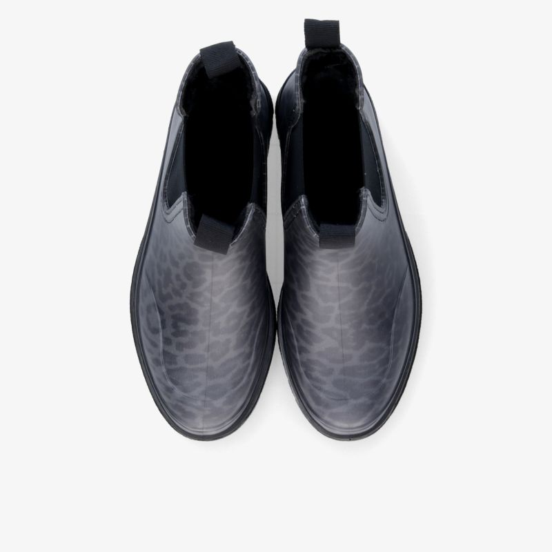 Modernes Schuhpaar in Schwarz und Grau mit bequemem Slip-on-Einstieg, runder Spitze und markanter Struktur von oben