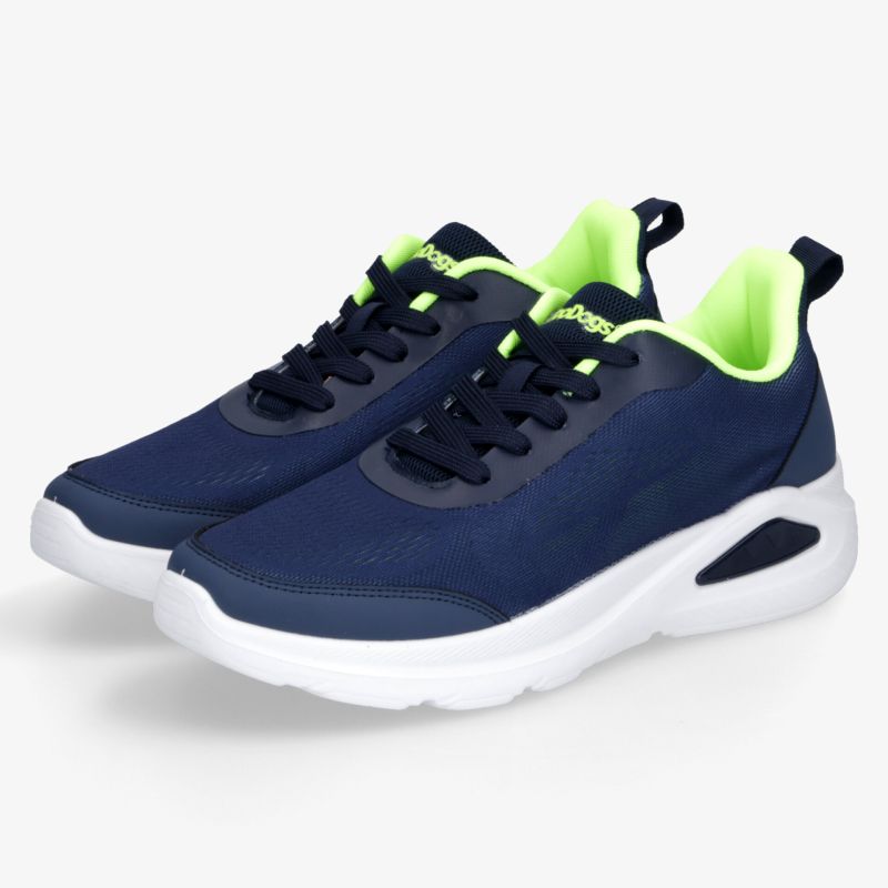 Moderne Sneaker in Marineblau mit leuchtend grünen Akzenten, bequemer Dämpfung und markanter weißer Profilsohle