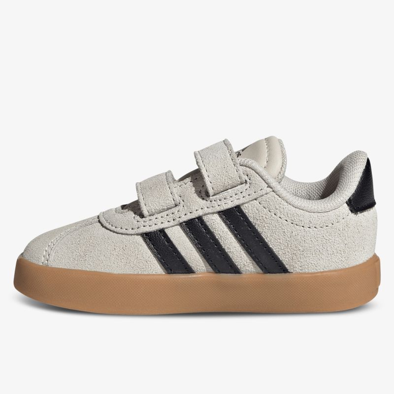 Seitliche Ansicht des bequemen Schuhs mit robusten Gummisohlen und praktischem Klettverschluss