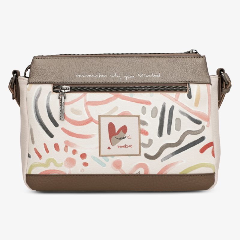 Stylische Tasche mit buntem Muster und praktischem Reißverschluss für vielseitige Einsatzmöglichkeiten.