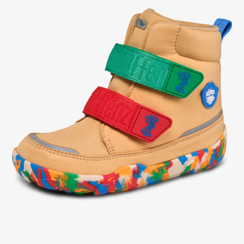 Bequemer Schuh mit buntem Sohlenrand und zwei farbigen Klettverschlüssen für leichten Halt