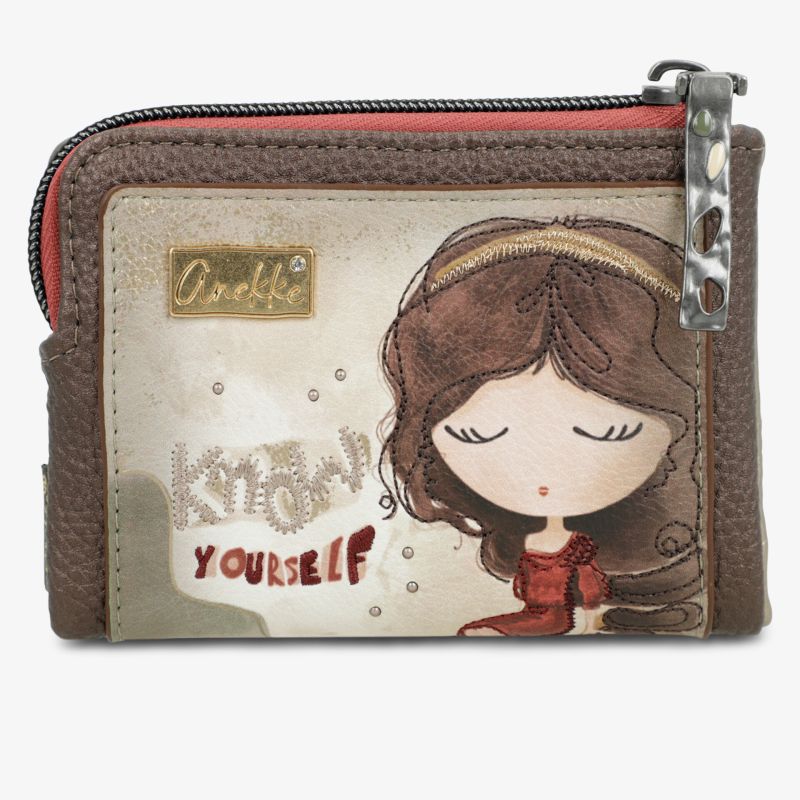 Handliche Geldbörse aus Kunstleder mit Reißverschluss und charmantem Cartoon-Design.