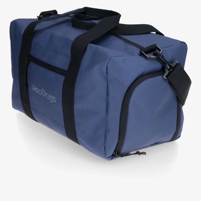 Robuste blaue Reisetasche mit großem Stauraum und verstellbarem Schultergurt für vielseitigen Einsatz