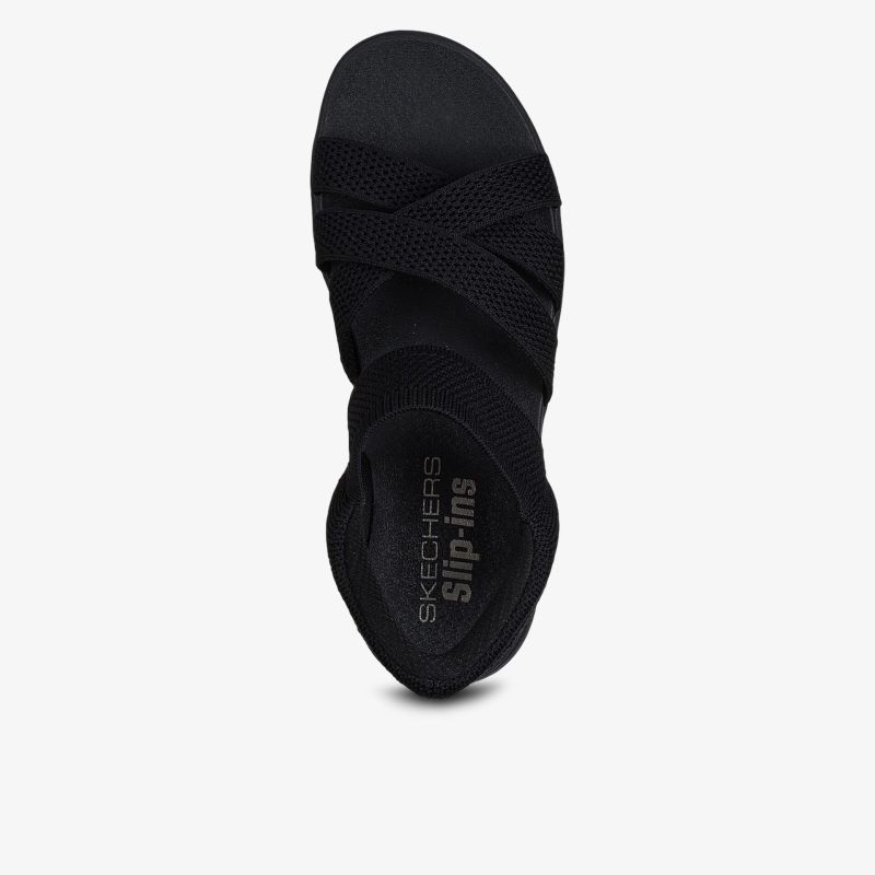 Schwarzer Sneaker mit elastischem Verschluss und rutschfester Sohle, ideal für Komfort und Stil.