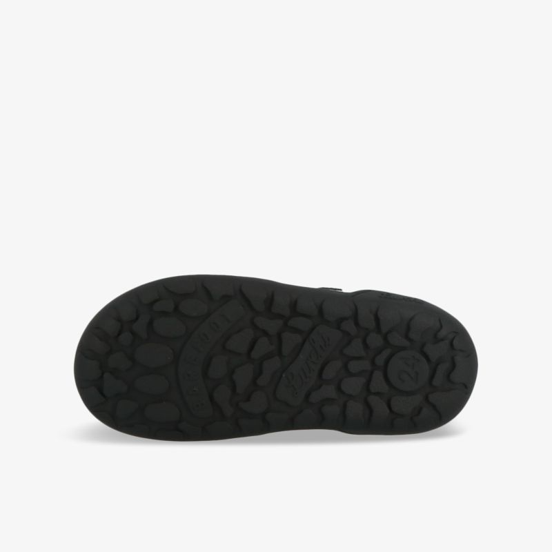 Robuste schwarze Schuhsohle mit griffigem Profil für sicheren Halt und hohen Tragekomfort bei jedem Schritt