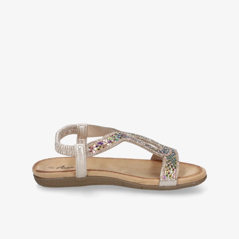 Leichte Sandale mit bequemen Fußbett und funkelnden Verzierungen, seitliche Ansicht