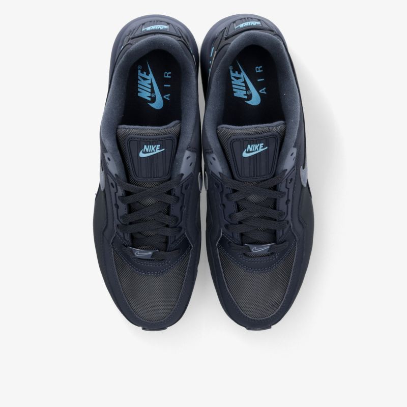 Dunkelblaue Nike Laufschuhe mit atmungsaktivem Material, leichter Dämpfung und rutschfester Sohle in Draufsicht gezeigt