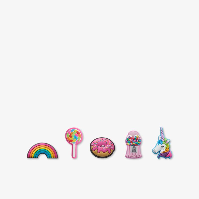 Farbige Kinderspielzeuge in Form von Regenbogen, Lupe, Donut, Musikspielzeug und Einhorn mit lebendigen Farben