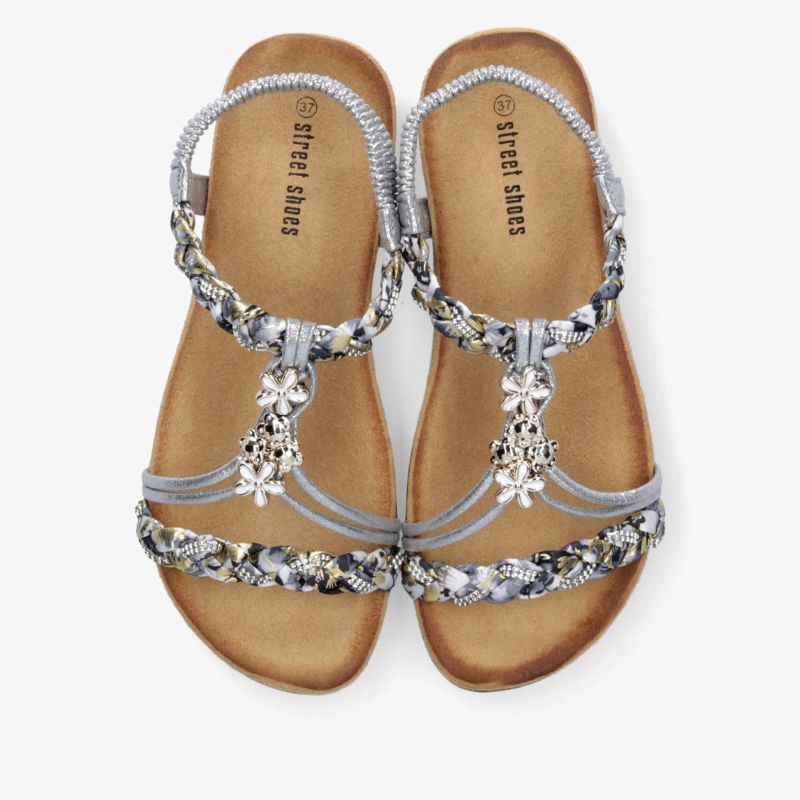 Elegante Sandalen mit funkelndem Strassbesatz und bequemem Fußbett in Draufsicht als Paar
