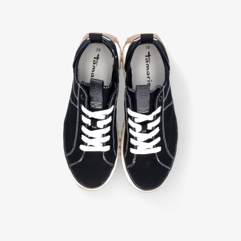 Schwarze Sneaker mit weißen Schnürsenkeln, komfortables und modisches Design, robuste und bequeme Schuhe