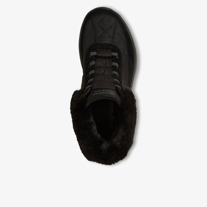 Schwarzer Schuh mit weichem Lammfell-Futter und robuster Schnürung für optimalen Komfort