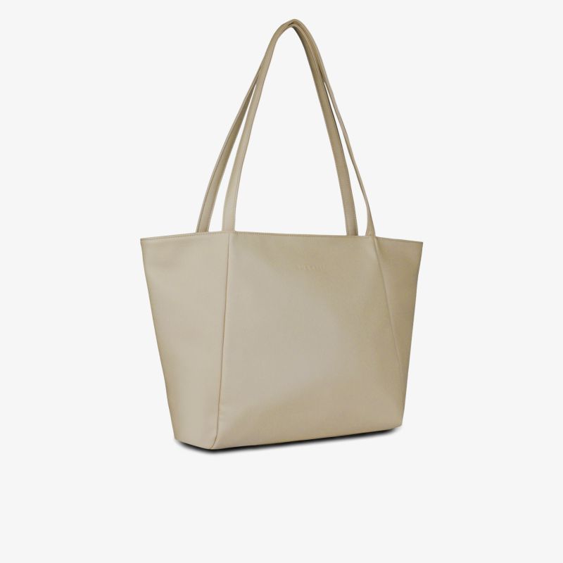 Beige große Handtasche mit geräumigem Hauptfach und komfortablen Tragegriffen, schlichtes und elegantes Design