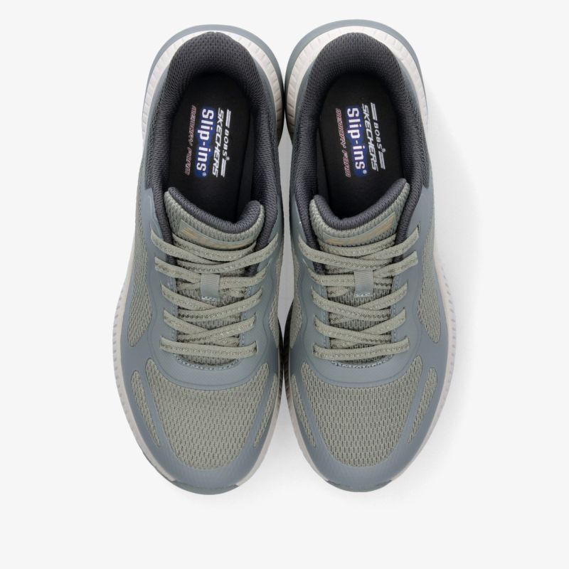 Leichte graue Sportschuhe mit atmungsaktivem Material und gepolstertem Kragen, Draufsicht zeigt beide Schuhe