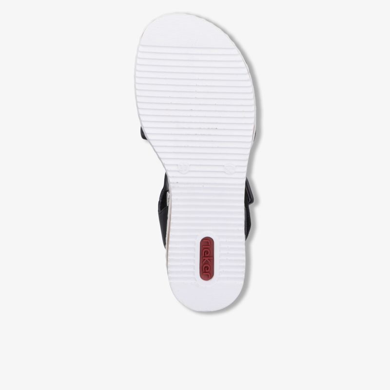 Weiße, profilierte Sohle eines Schuhs mit rutschfester Oberfläche und strapazierfähigem Design