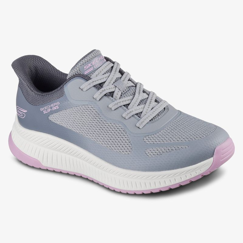 Bequemer, atmungsaktiver Sportschuh in Grau mit rosa Details und stabiler Sohle für optimalen Halt.