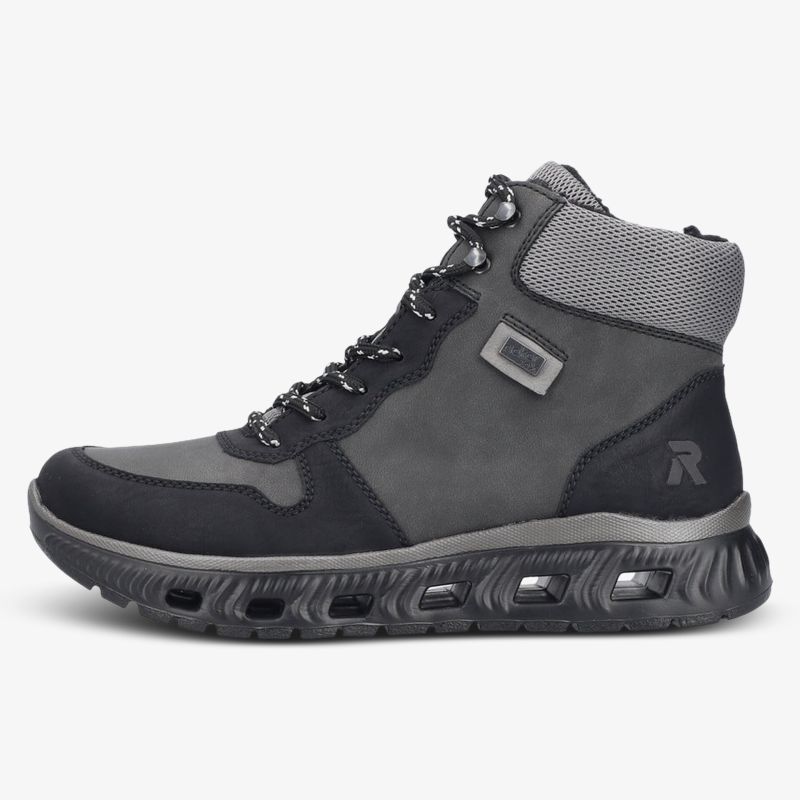 Moderner robuster grauer Schuh mit atmungsaktivem Material und rutschfester Sohle
