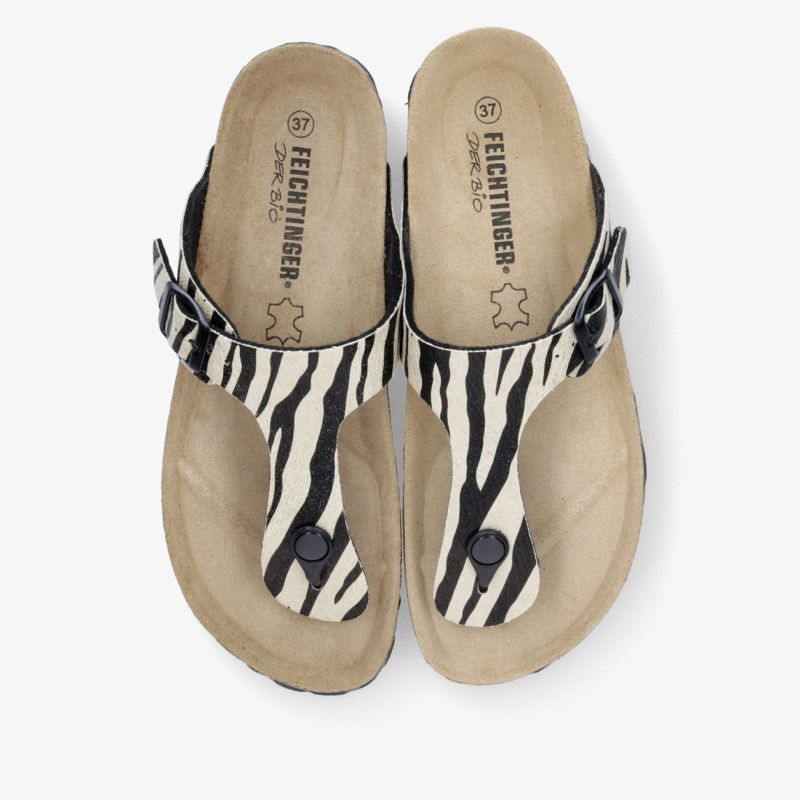Bequeme Zehensteg Sandalen mit weichem Fußbett, verstellbarem Riemen und markantem Zebra-Muster in Top-Down Draufsicht