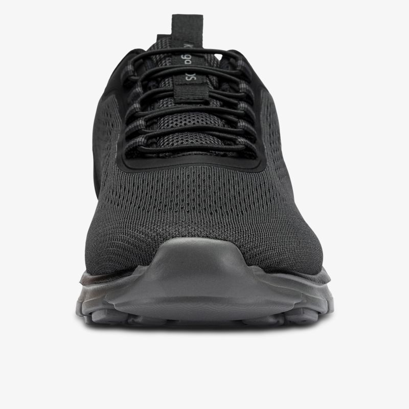 Schwarzer sportlicher Schuh mit atmungsaktivem Obermaterial und stabiler Frontansicht