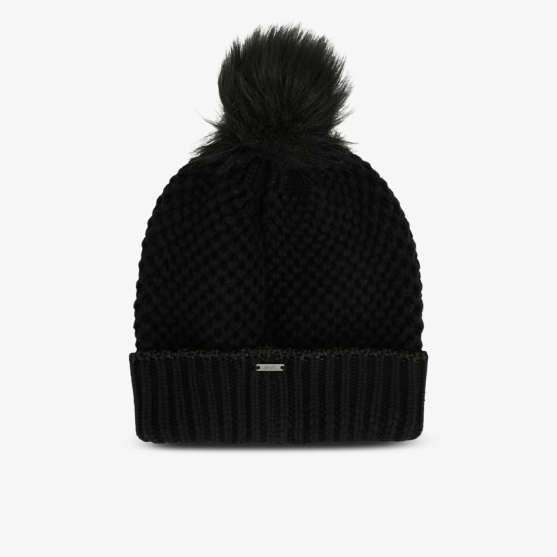 Schwarze Strickmütze mit Bommel und weicher Struktur, ideal für kalte Tage.