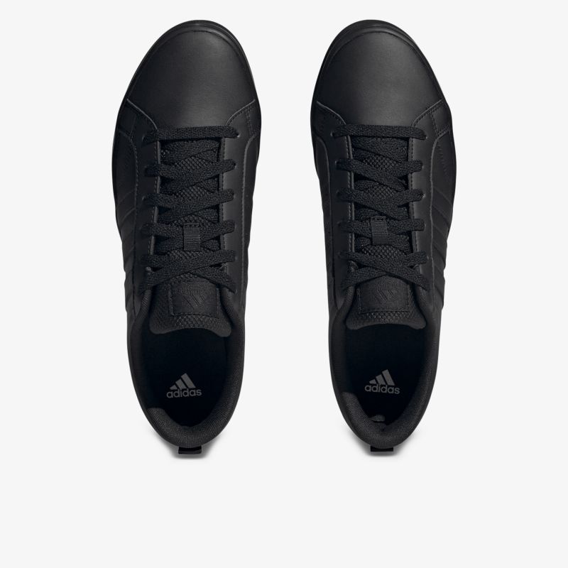 Schwarze sportliche Schuhe mit Schnürsenkeln, komfortabel und langlebig, klassische Optik