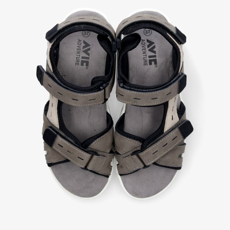 Bequeme und leichte Sandalen mit verstellbaren Riegeln und rutschfester Sohle in Beige und Schwarz