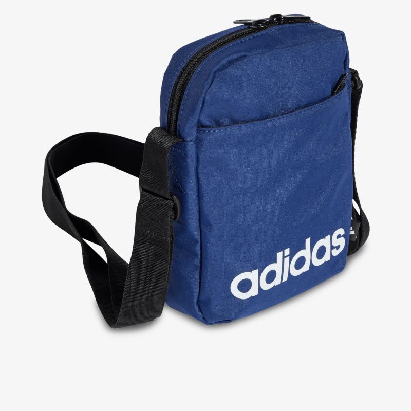 Kleine blaue Umhängetasche mit weißem adidas Logo und verstellbarem Schultergurt, kompakt und praktisch