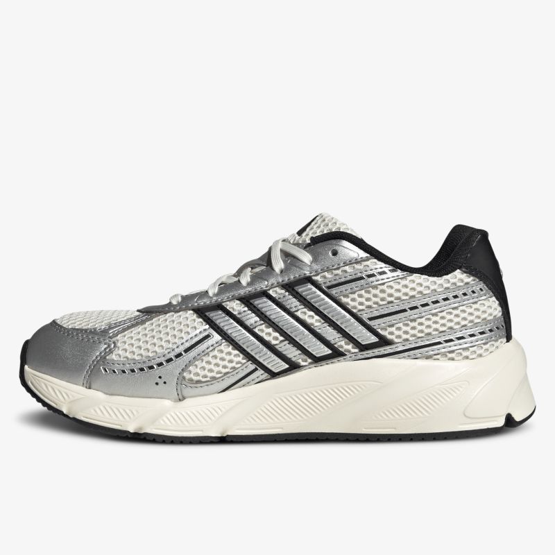 Moderner leichter Laufschuh mit atmungsaktivem Obermaterial und dämpfender Sohle in seitlicher Ansicht