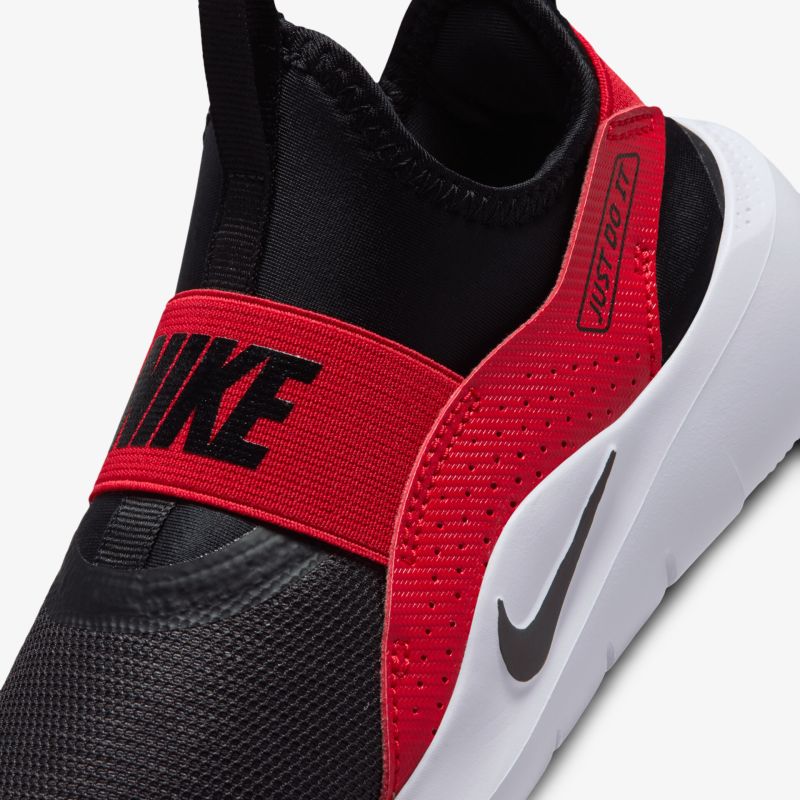 Sportlicher Sneaker mit rotem Riemen und dynamischem Design für optimalen Tragekomfort