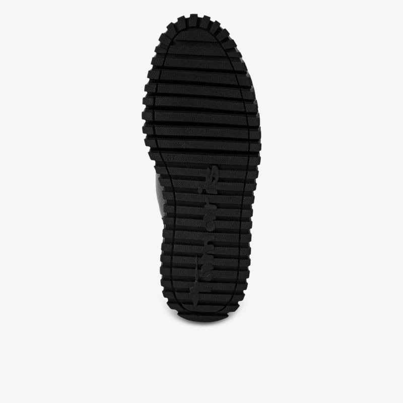 Schwarze rutschfeste Gummisohle mit tiefem Profil für optimalen Halt und langlebige Nutzung