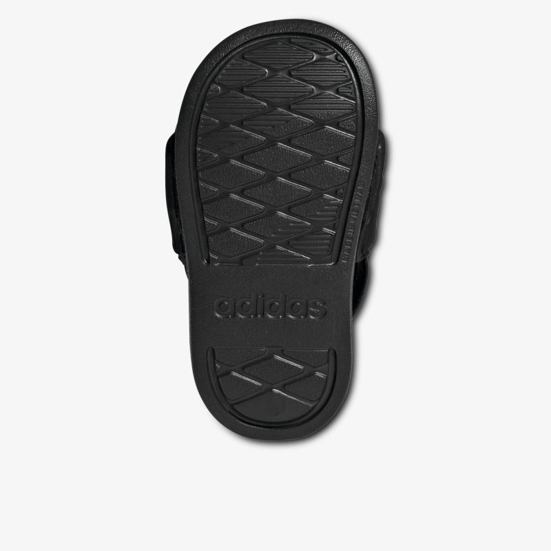Rutschfeste und robuste schwarze Schuhsohle mit tiefem Profil für guten Halt und Komfort