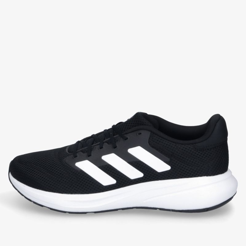 Leichter Sportschuh in Schwarz mit weißer Sohle, atmungsaktiv und komfortabel mit schnürung und stoßdämpfung
