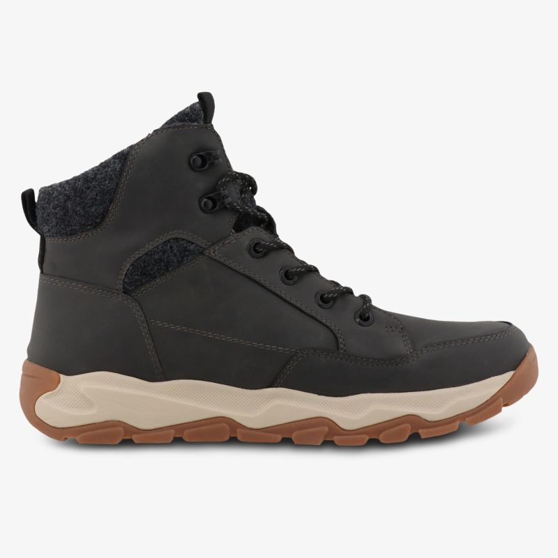 Robuster schwarzer Winterschuh mit warmem Futter, wasserabweisend und rutschfester brauner Sohle für besten Halt