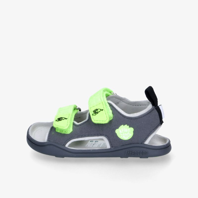 Graue Sandalen mit leuchtenden Verschlüssen und ergonomischem Design für optimalen Tragekomfort und sicheren Halt.